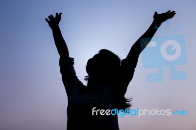 Silhouette Of Free Happy Woman Stock Photo