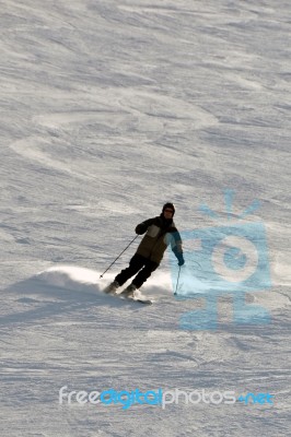 Skier In Powder Snow Stock Photo