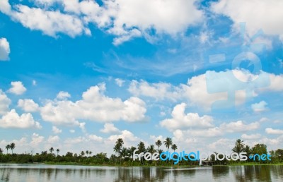Sky And Pond Stock Photo
