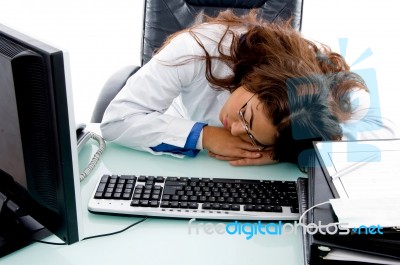 Sleeping Doctor In Clinic Stock Photo