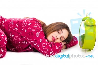 Sleeping Girl With Clock Stock Photo
