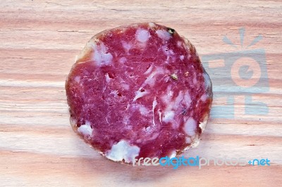 Slice Of Red Lithuianian Salami Stock Photo
