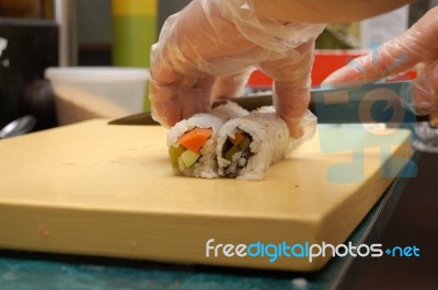 Slicing Sushi Stock Photo