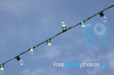 Small Lamp Rope For Event On Blu Sky Stock Photo