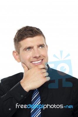 Smart Young Business Consultant Thinking Stock Photo
