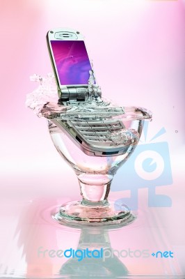 Smartphones In The Glass Stock Photo