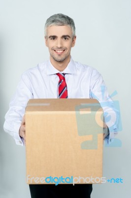 Smiling Aged Delivery Man Stock Photo