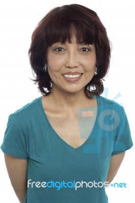 Smiling Asian Woman On White Stock Photo