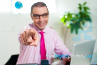 Smiling Business Professional Pointing You Out Stock Photo