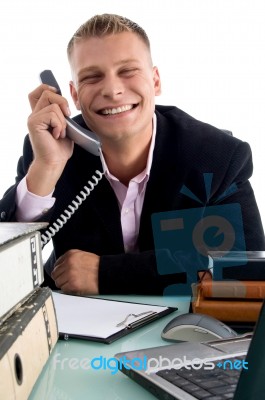 Smiling Businessman Holding Phone Stock Photo