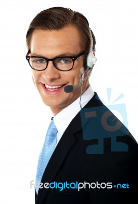 Smiling Call Centre Male Executive Stock Photo