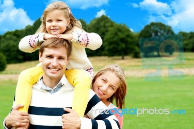 Smiling Family In Outdoors Stock Photo