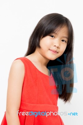 Smiling Little Asian Girl In Red Dress Stock Photo