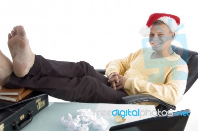 Smiling Man Wearing Christmas Hat Stock Photo