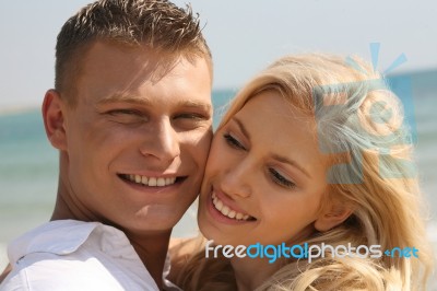 Smiling Romantic Couples Stock Photo