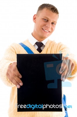 Smiling Student Showing notebook Stock Photo