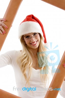 Smiling Woman Holding Frame Stock Photo