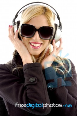 Smiling Woman Listening Music Stock Photo