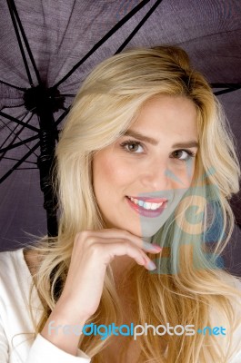 Smiling Woman With Umbrella Stock Photo