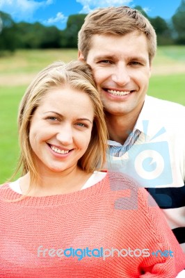 Smiling Young Couple In Outdoor Stock Photo