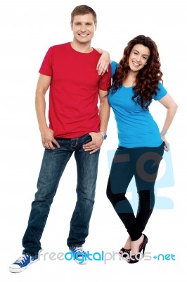 Smiling Young Couple Standing Stock Photo