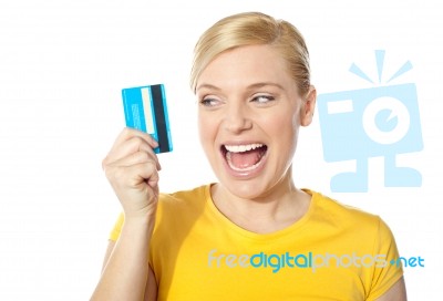 Smiling Young Girl Holding Debit-card Stock Photo