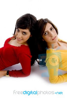 Smiling Young Girls Leaning Stock Photo
