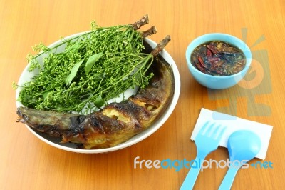 Snake Head Fish Grilled And Nim Leaf Dip With Sweet Paste On Table Stock Photo