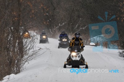 Snowmobiles On Trail Stock Photo