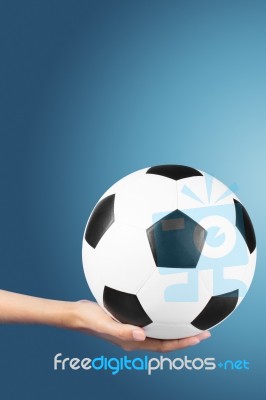 Soccer Ball In Hand Stock Photo