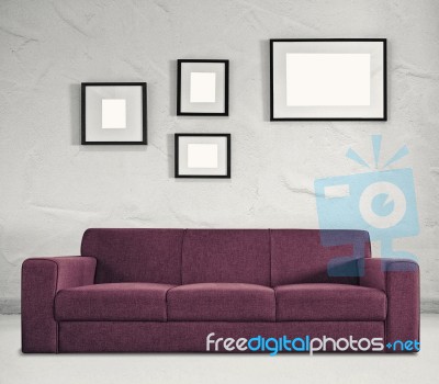Sofa And Empty Frames Stock Photo