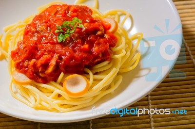 Spaghetti Decorated With Coriander Leaf Stock Photo