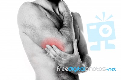 Sports Injury - Pain In The Elbow Stock Photo