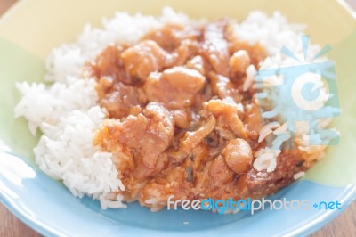 Stirred Pork With Sauce Top On Rice Stock Photo