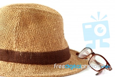 Straw Hat With Glasses On White Stock Photo