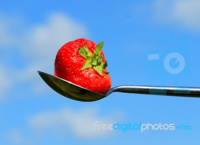 Strawberry On Spoon Stock Photo