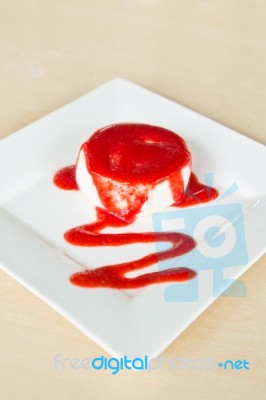 Strawberry Sauce On Cake Stock Photo