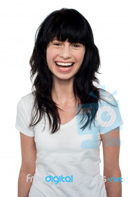 Studio Shot Of Beautiful Smiling Woman Stock Photo