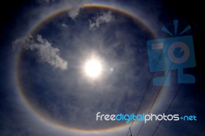 Sun With Circular Rainbow Stock Photo