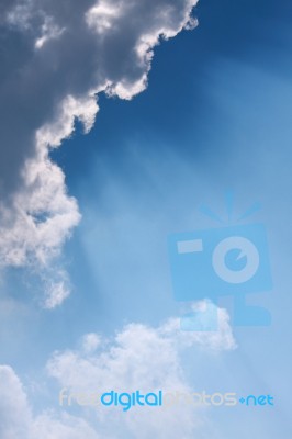 Sunlight Behind Cloud Stock Photo