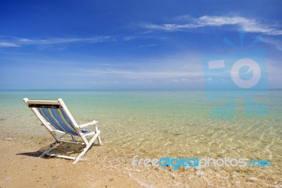 Sunlounger In Seashore Stock Photo