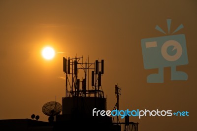 Sunset At Satellite Dish And Antenna Stock Photo