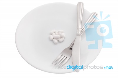 Supplement Pills On Plate Stock Photo