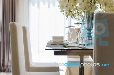 Table Set In Dinning Room At Home Stock Photo
