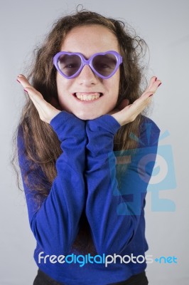 Teen With Heart Shaped Sunglasses Stock Photo