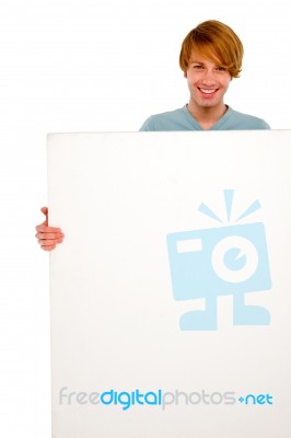 Teenage Boy Holding Blank Board Stock Photo