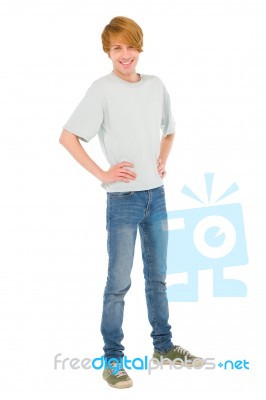 Teenage Boy standing with akimbo Stock Photo