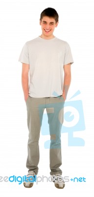 Teenage Boy With Hands In Pockets Stock Photo