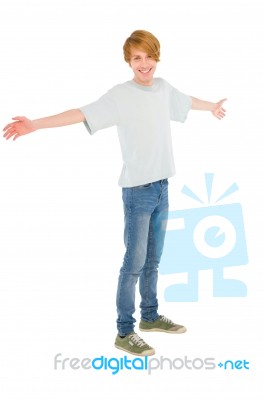 Teenage Boy With Open Arms Stock Photo
