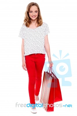 Teenage Girl Carrying Shopping Bag Stock Photo